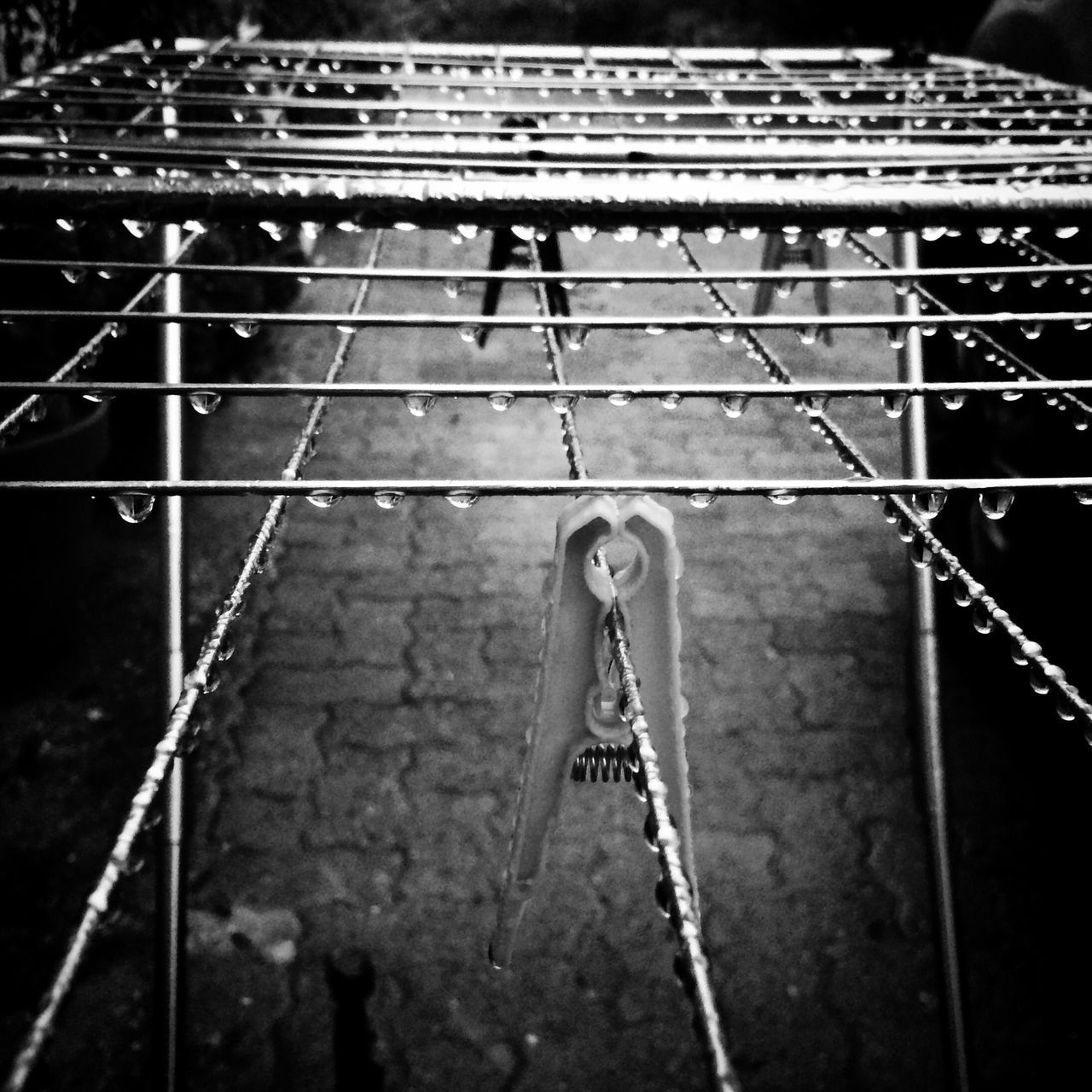 LOW ANGLE VIEW OF BOY PLAYING ROPE