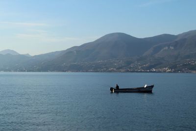 Scenic view of sea against mountains