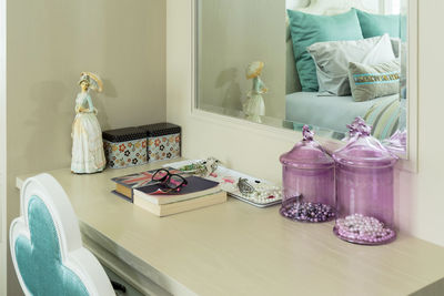 View of wine bottles on table at home