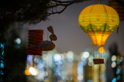 Close-up of illuminated christmas lights at night