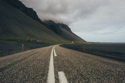 Surface level of empty road along landscape