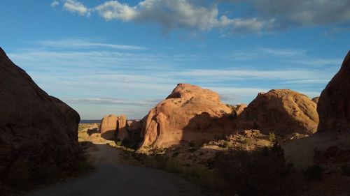 Panoramic view of landscape against cloudy sky