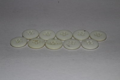 Close-up of candies against white background