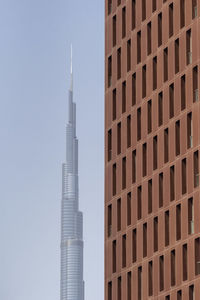 Low angle view of buildings against clear sky