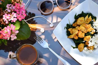 High angle view of flowers in plate on table