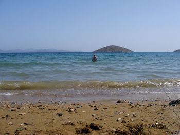 Scenic view of sea against clear sky