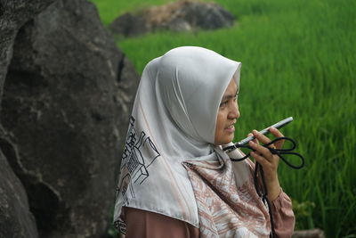 Woman holding umbrella