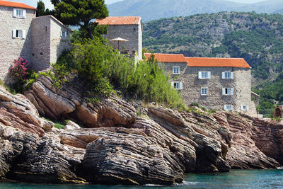 View of buildings by sea