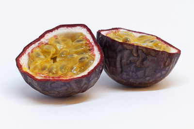 Close-up of fruits against white background