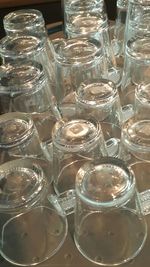 Close-up of wine glasses on table