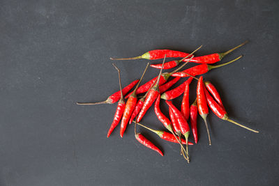 High angle view of red chili peppers in container