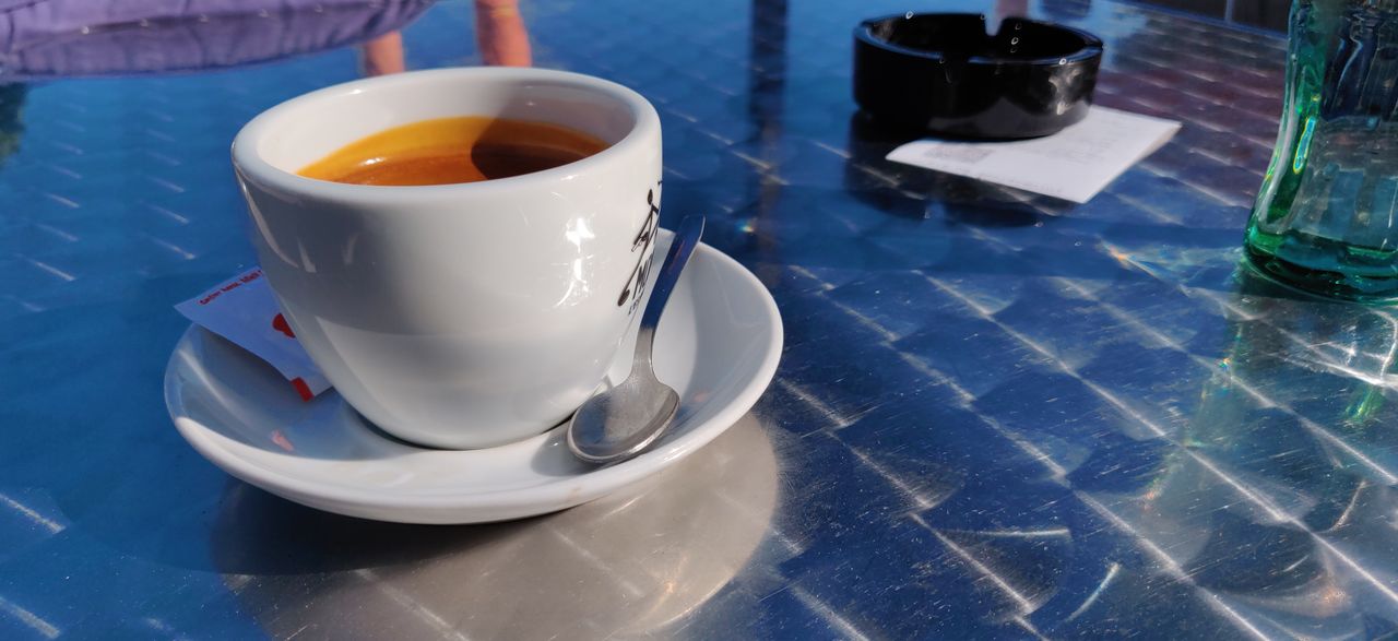 HIGH ANGLE VIEW OF COFFEE AND CUP OF TEA