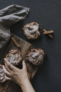 Hand reaching for bun