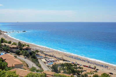 High angle view of swimming pool by sea against sky