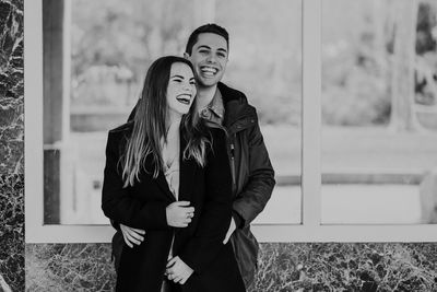 Young couple standing outdoors
