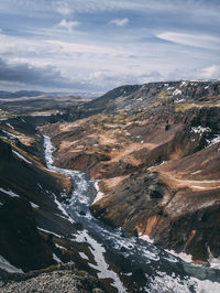 Aerial view of landscape against sky during winter