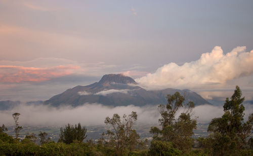 Scenic view of mountains against sky during sunset