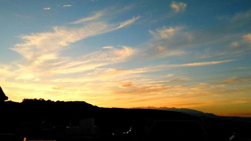 Scenic view of landscape against sky during sunset