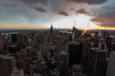 Aerial view of city at sunset