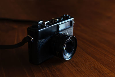 Close-up of camera on table