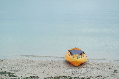 View of boat on beach against sky