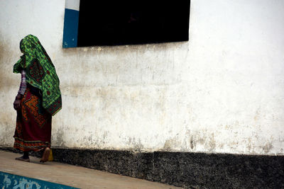 Woman with umbrella on floor