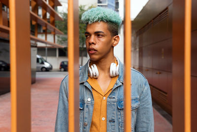 Portrait of young man looking away