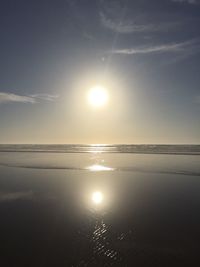 Scenic view of sea against sky at sunset