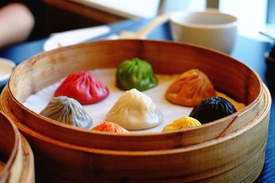 Close-up of colorful dumplings in bento box
