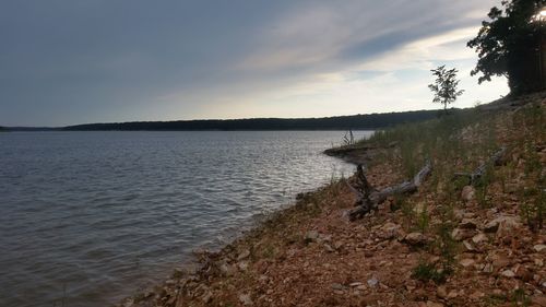 Scenic view of calm sea against sky