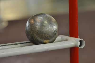 Close-up of balls on rack