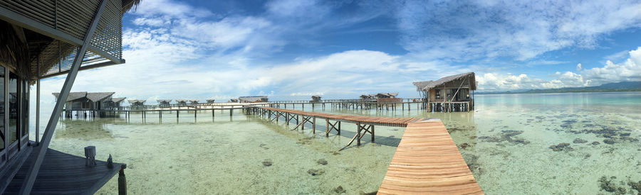 Pier on sea against sky