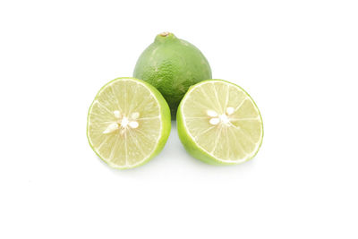 Close-up of fruits against white background