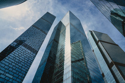 Low angle view of modern buildings against sky