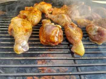 Close-up of meat on barbecue grill