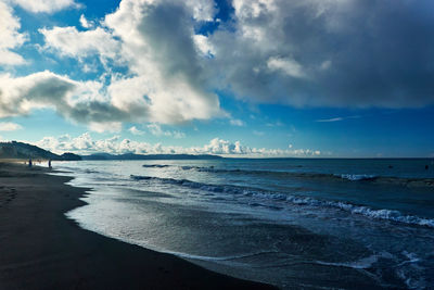 Scenic view of beach against sky in the morning