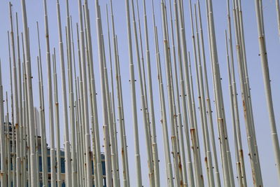 Low angle view of metallic poles