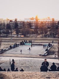 People in city against clear sky