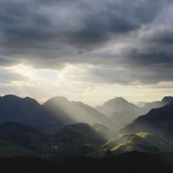 Scenic view of mountains against sky during sunset