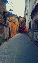 Narrow alley along buildings