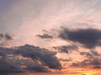 Low angle view of clouds in sky during sunset