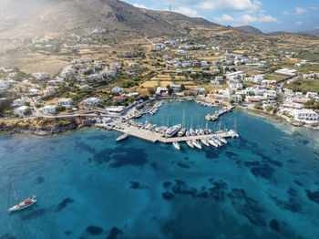 High angle view of townscape by sea