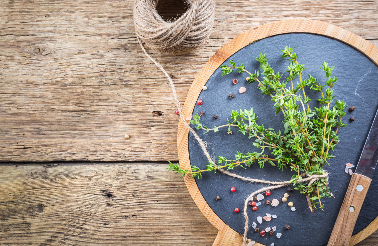 HIGH ANGLE VIEW OF VEGETABLES ON TABLE AGAINST WALL