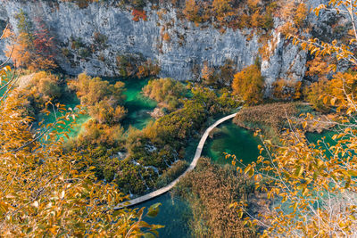 Autumn landscape with path across lake at plitvice lakes national park in croatia