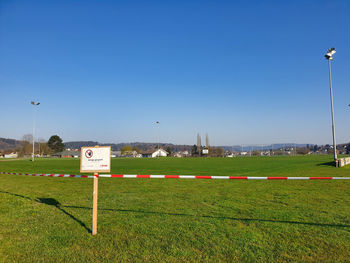 Scenic view of field against clear sky