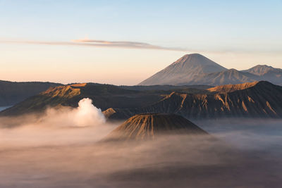 View of mountain range against sky during sunset