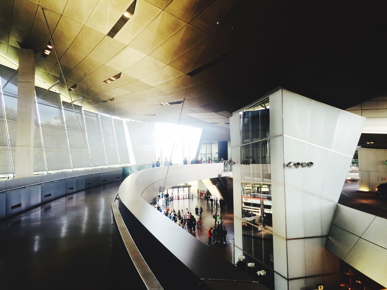 built structure, public transportation, architecture, indoors, transportation, rail transportation, railroad station, railroad station platform, railroad track, modern, airport, no people, train - vehicle, travel, illuminated, day, ceiling, airplane, sunlight, building exterior