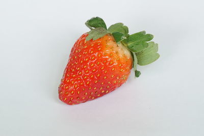 High angle view of strawberry against white background