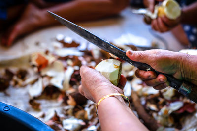 Close-up of hand holding ice cream