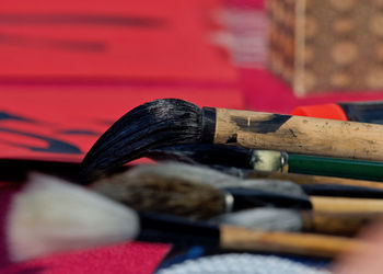 Close-up of multi colored pencils on table